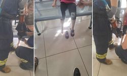 Posta gişesindeki banka bacağı sıkışan çocuğu itfaiye kurtardı