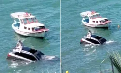 Otomobiliyle denize uçtu: Üzerine oturup yardım bekledi!