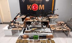 Uşak'ta bir ev ve iş yerinde 8 tabanca, 17 tüfek ele geçirildi