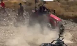 Tartıştığı kişilerin üzerine traktör sürdü