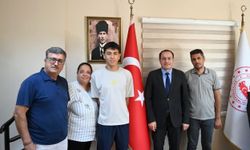 Kaymakam Türker, şampiyon atleti kabul etti