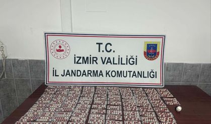 İzmir'de durdurulan araçta 1456 sentetik hap ele geçirildi