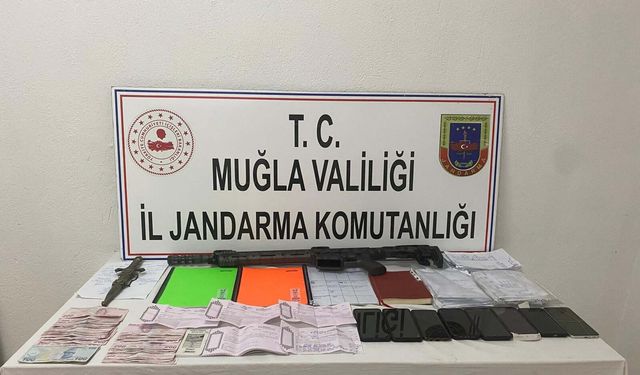 Muğla'da tefeci ve göçmen kaçakçılığı baskını: 2 tutuklama