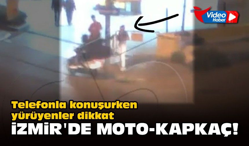 Telefonla konuşurken yürüyenler dikkat... İzmir'de moto-kapkaç!