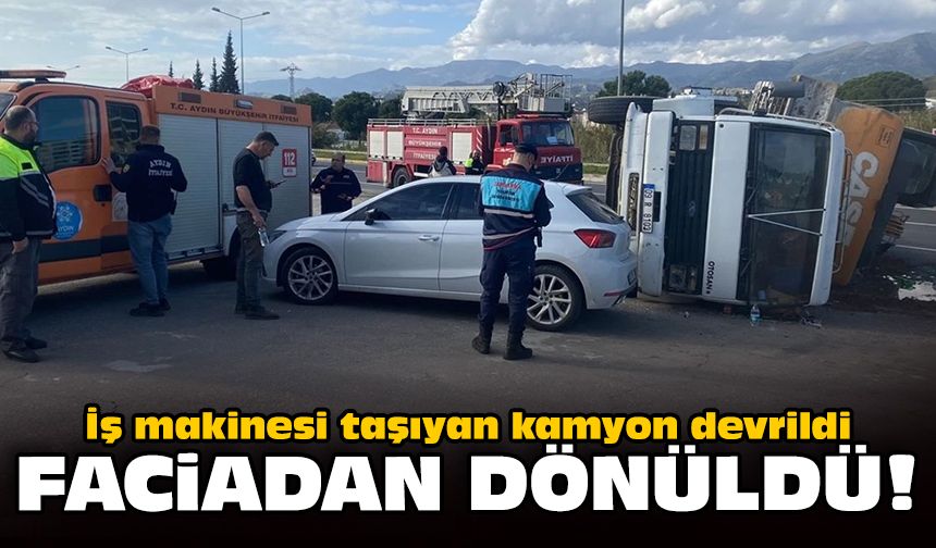 İş makinesi taşıyan kamyon devrildi: Faciadan dönüldü!