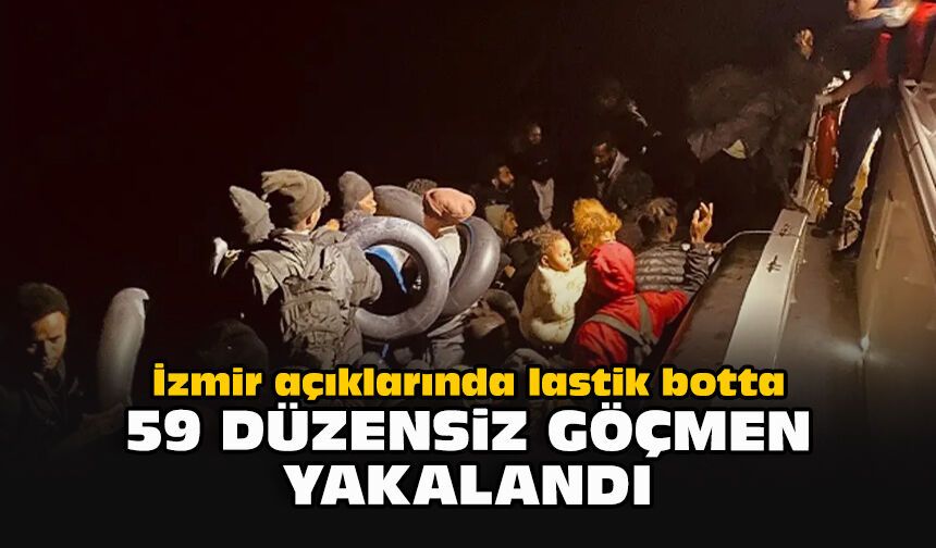 İzmir açıklarında lastik botta 59 düzensiz göçmen yakalandı