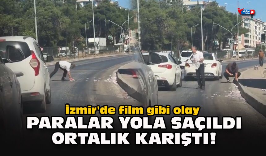 İzmir'de film gibi olay: Paralar yola saçıldı, ortalık karıştı!