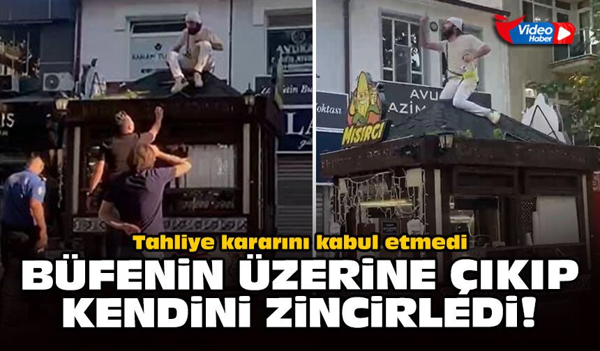 Tahliye kararını kabul etmedi: Büfenin üzerine çıkıp kendini zincirledi